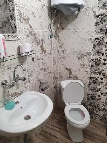 Фото номера Трехместный номер с собственной ванной комнатой Гостевой дом Rooms Lagat г. Троян 16